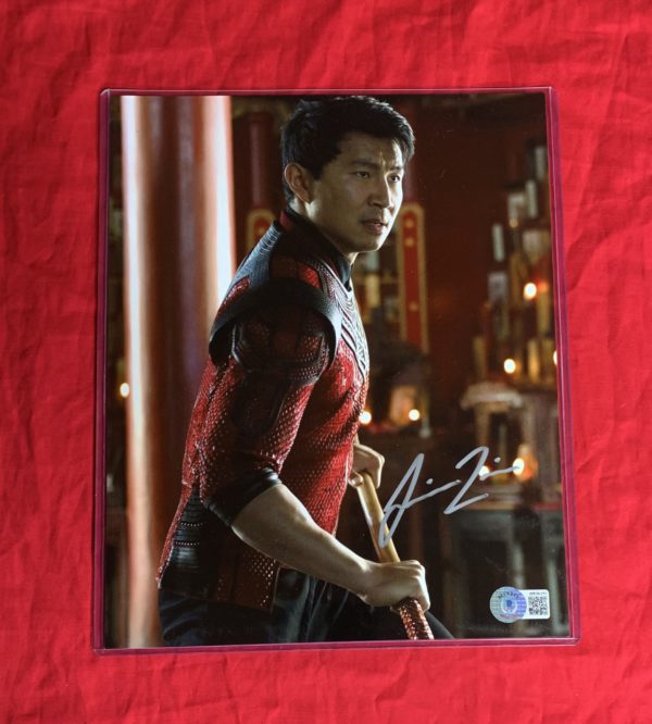 IN STOCK:   SHANG-CHI LEGEND OF THE TEN RINGS 8X10 (BO STAFF~SIDE)~ SIGNED BY SIMU LIU+BAS COA
